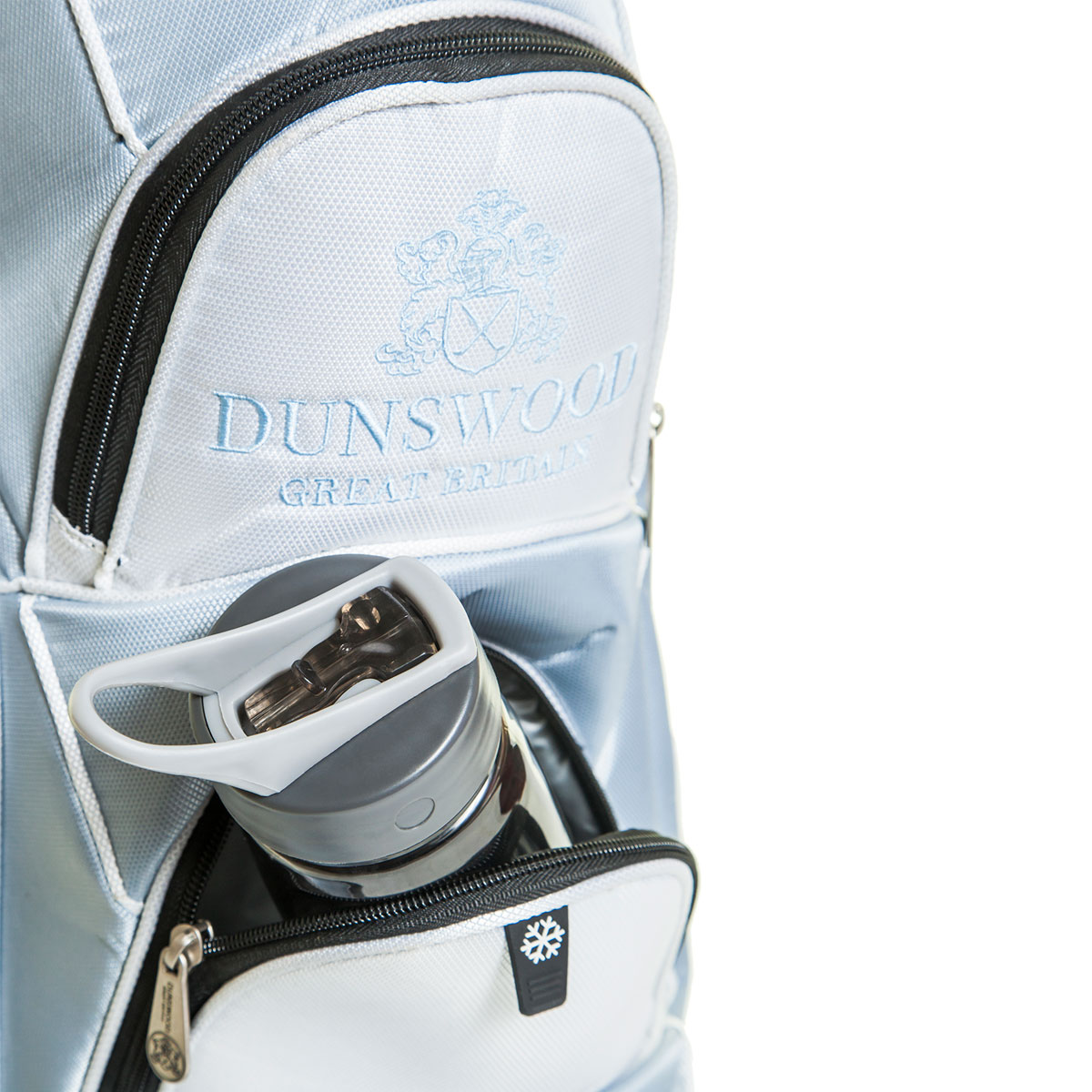Pocket detail of the Knight Cart Bag with a water bottle